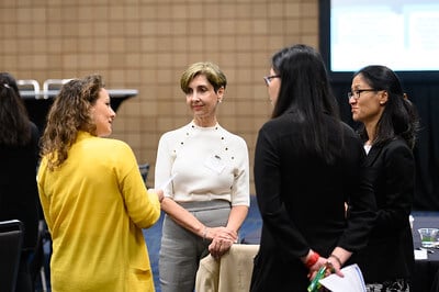 Group of WLDP mentees and mentors talking