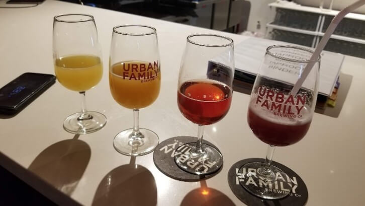 Sample of IPAs, sours, and a slushy brew at Urban Family Brewing in Seattle