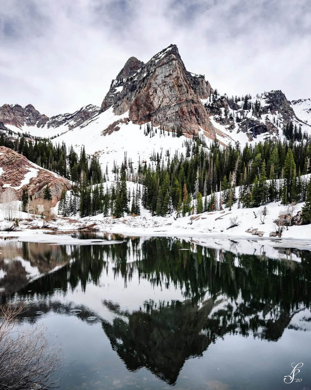Lake Blanche with snowy Wasatch mountains in the background