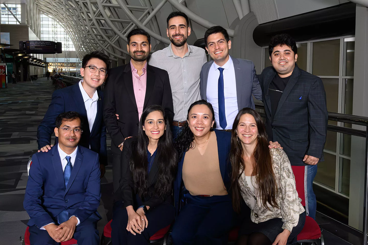 2025 DCERF alumni posed in two rows and smiling